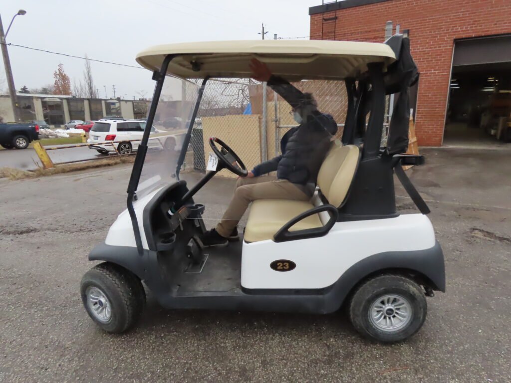 Golf cart passenger divider